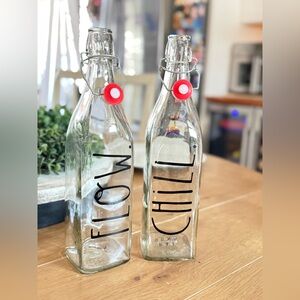 Rae Dunn glass bottles x 2 (set)